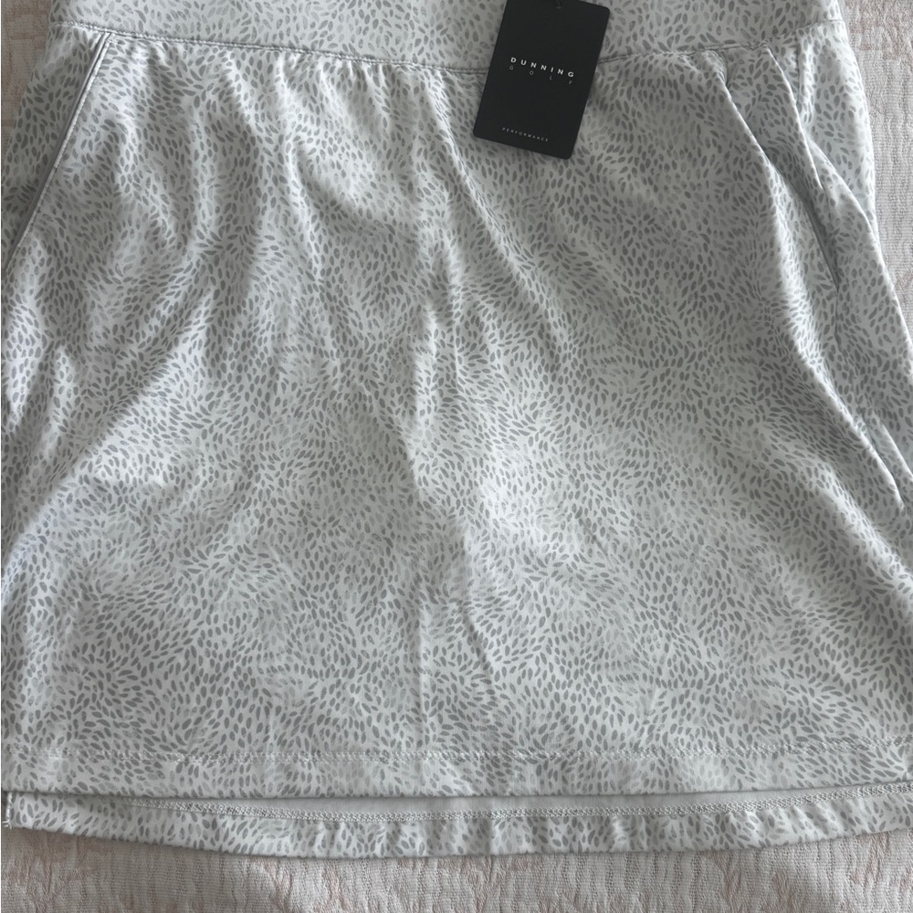 Dunning golf /tennis skirtElegant White Patterned Skirt by Express size M